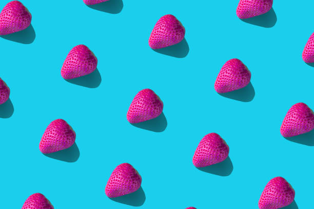 Colorful pattern of strawberries on blue background. high resolution