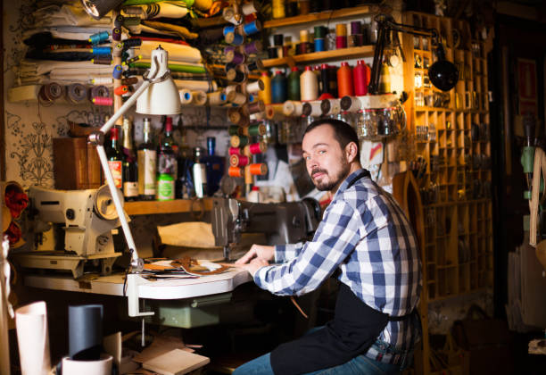 istock Male worker stitching new belt 1131105863