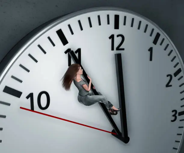 Employee clings herself desperately to the clock to get more time so she can still keep the deadline
