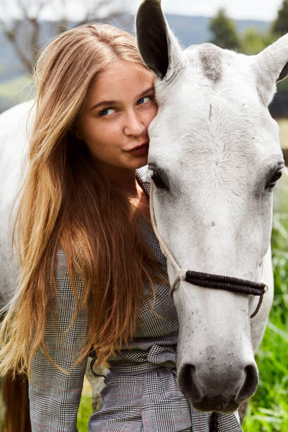 istock Gorgeous girl and pony 1131107621