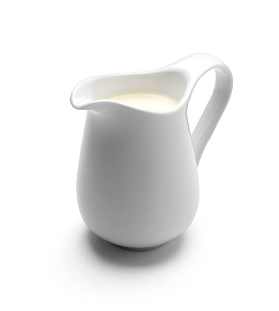 istock Milk or cream jug isolated on white background 1131111437