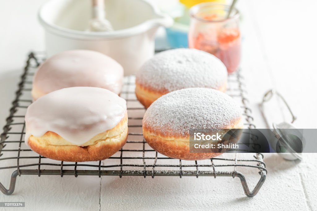 Sweet and brown donuts ready to eat Pączki Stock Photo