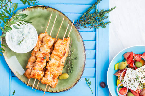 traditional greek chicken souvlaki with tzatziki sauce - opa! souvlaki of greece imagens e fotografias de stock