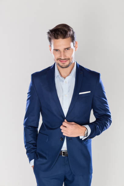 istock Stylish business man on gray background 1131114208