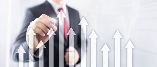 istock Up arrow graph on skyscraper background. Invesment and financial growth concept. 1131116485