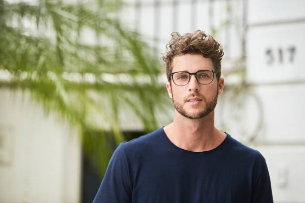 Handsome in glasses Handsome young guy in glasses, portrait 25 year old man portrait stock pictures, royalty-free photos & images