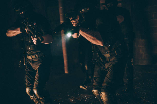 istock Special forces police team in action 1131121671