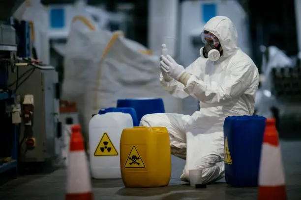 Photo of Factory worker working with dangerous materials