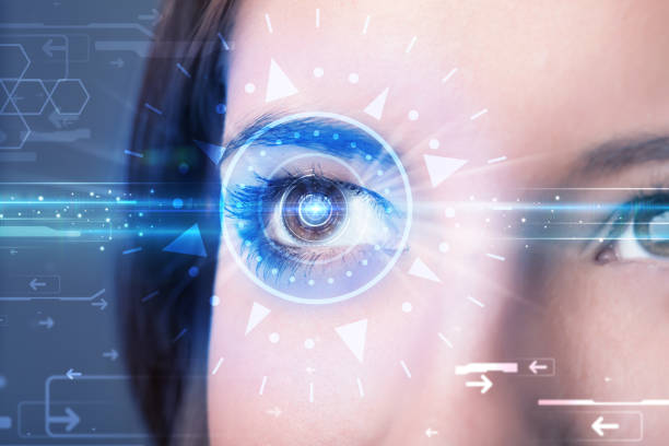 istock Cyber girl with technolgy eye looking into blue iris 1131123072