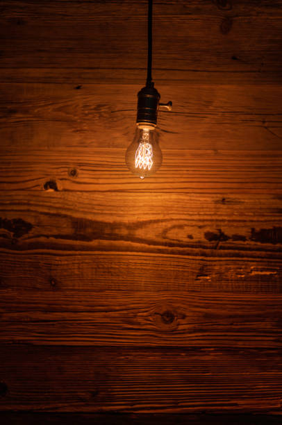 istock light bulb against a wooden background (HDRi) 1131125270