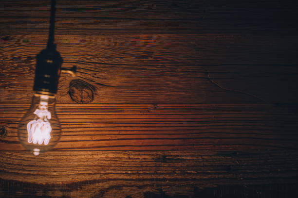istock light bulb against a wooden background (HDRi) 1131125277