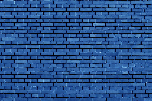 Nebulas Blue colored brick wall background