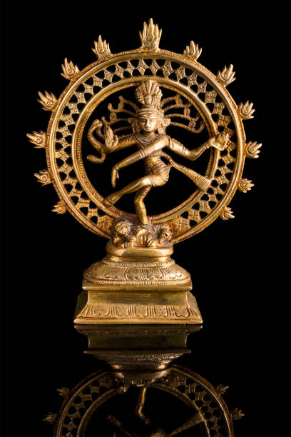 Statue of Shiva Nataraja - Lord of Dance Statue of indian hindu god Shiva Nataraja - Lord of Dance on black background with reflection bharatanatyam dancing stock pictures, royalty-free photos & images