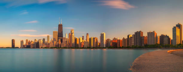 istock Chicago skyline at sunset viewed from North Avenue Beach 1131132422