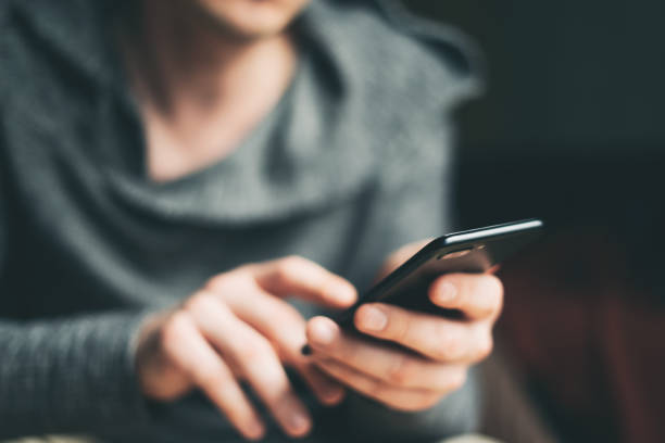 istock Young man with smartphone 1131135950