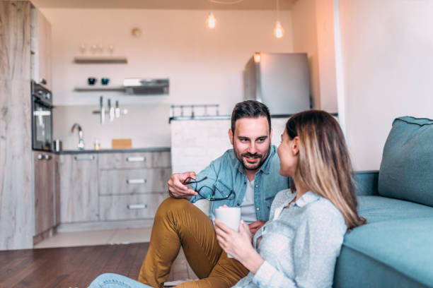 istock Close-up image of young couple talking indoors. 1131136530