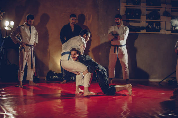 istock Two men fight on Brazilian jujitsu training 1131137482