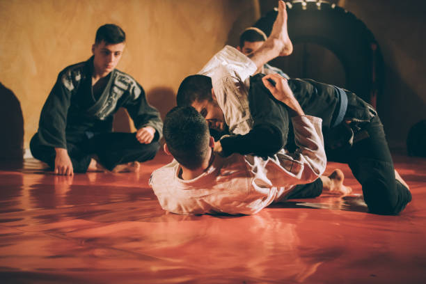 istock Two men fight on Brazilian jujitsu training 1131137582