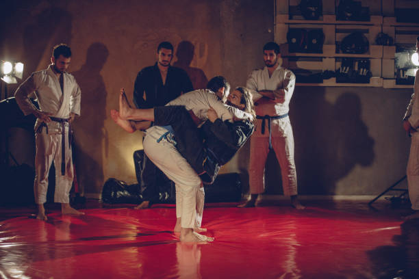 istock Two men sparing on Brazilian jujitsu training 1131138725