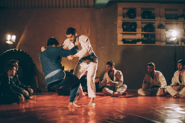 istock Two men fighting on Brazilian jujitsu training 1131138828