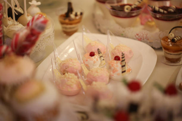 istock Delicious candy bar with macarons, cupcakes, cake pop and other sweets 1131140188