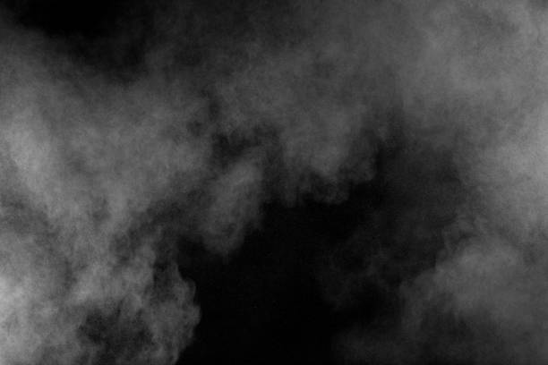 istock Bizarre forms of white powder explosion cloud against black background.White dust particles splash. 1131140662