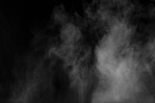 istock Bizarre forms of white powder explosion cloud against black background.White dust particles splash. 1131140686