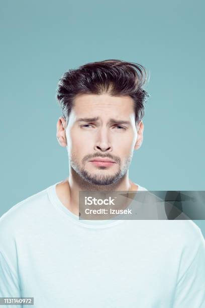 Young Man Staring At Camera Stock Photo - Download Image Now - 25-29 Years, Adult, Adults Only