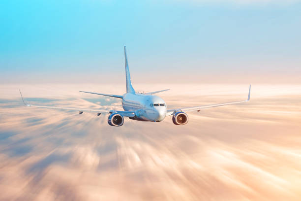 istock Travel by airplane, flight over the clouds evening sky sunset light 1131141152