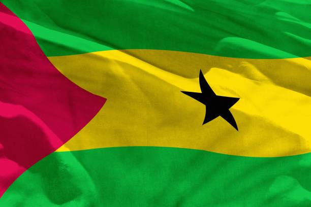 istock Waving Sao Tome and Principe flag for using as texture or background, the flag is fluttering on the wind 1131143584