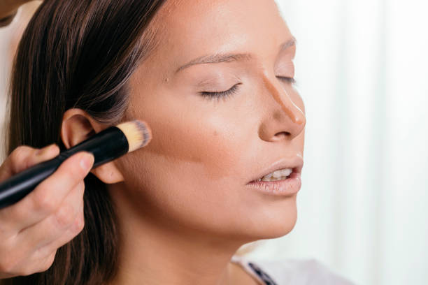istock Make up artist contouring the face 1131143784