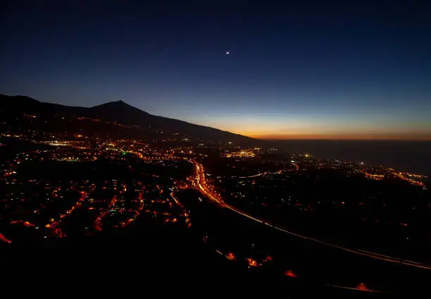 Light trails with a mountain