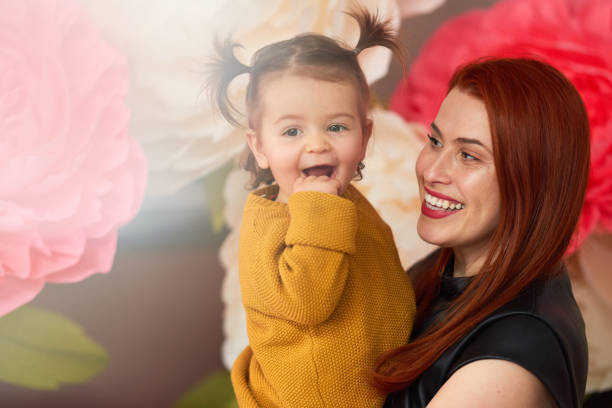 istock mother smiling with her baby 1131145467
