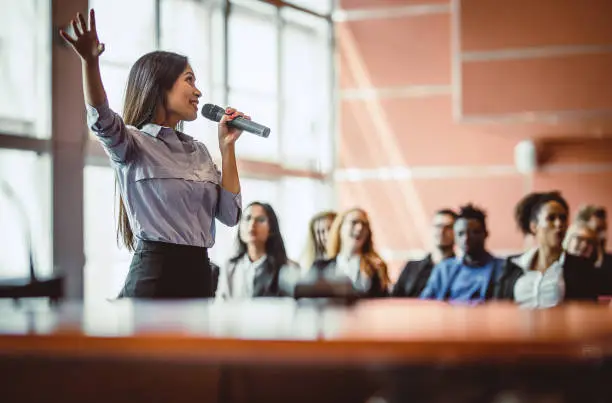 Photo of Business People Listening to the Public Speaker