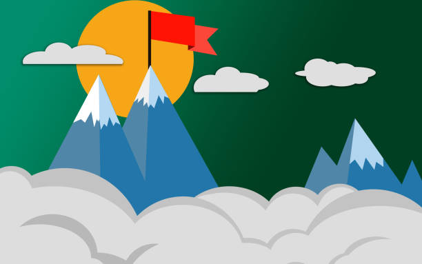 istock Top of the mountain with red flag 1131146956