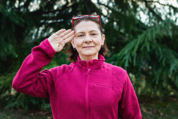 Woman using American sign language - hand gesture hello