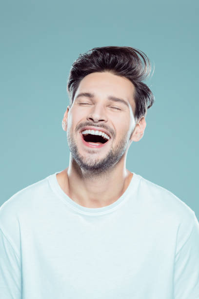 istock Close up of a laughing young man 1131148366