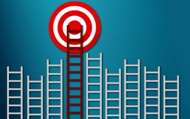 istock Long red ladder to goal target business concept 1131150135