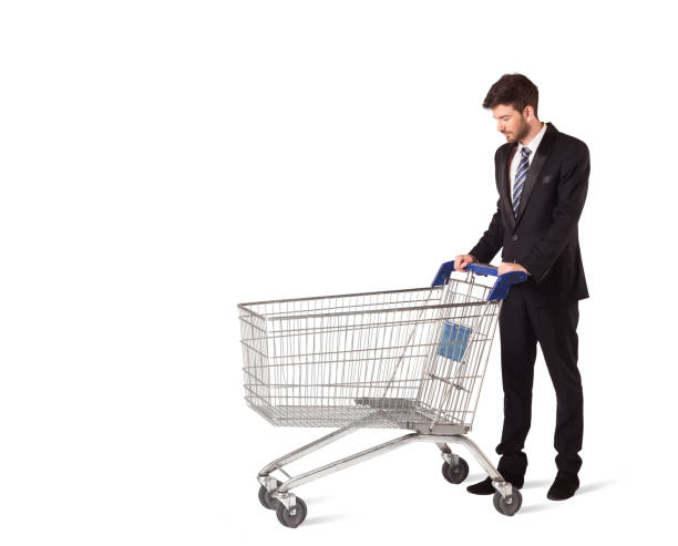 istock Businessman with shopping cart 1131151418