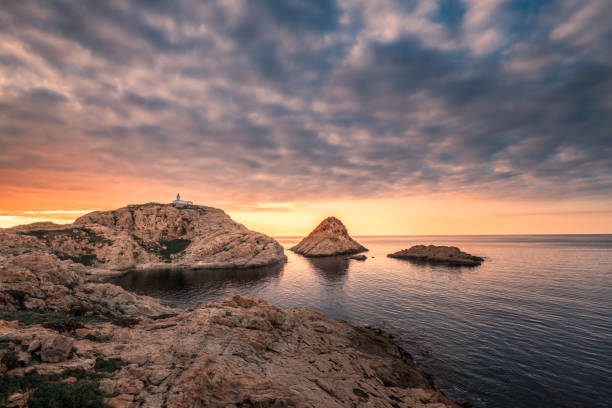 istock Lighthouse at sunset at Ile Rousse in Corsica 1131153133
