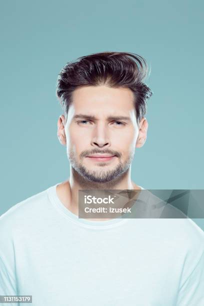 Disappointed Young Man Stock Photo - Download Image Now - Human Face, Close-up, Irritation