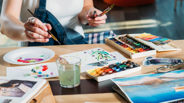 istock studio workplace woman painting hobby palette 1131154044