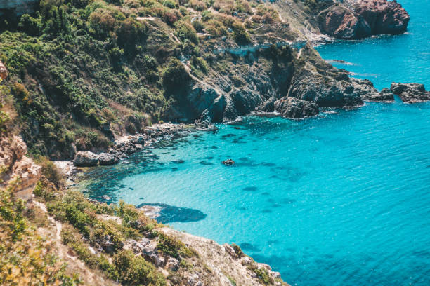 istock Bay with blue water and mountains 1131156293