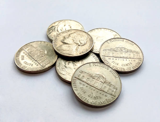istock American five cent coins usa on white background 1131160362