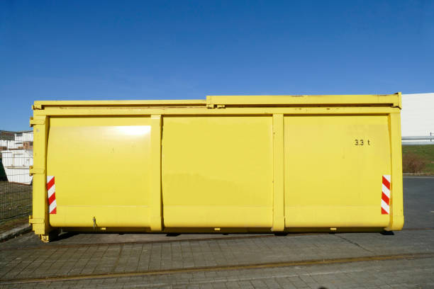 Sit off hollow for construction debris Yellow settling trough for construction rubble, blue sky schutt stock pictures, royalty-free photos & images