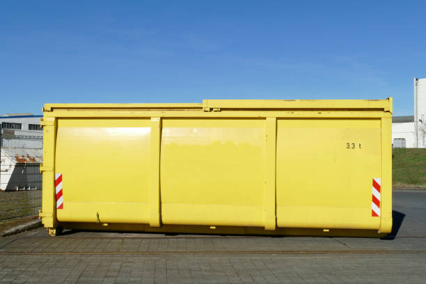 Sit off hollow for construction debris Yellow settling trough for construction rubble, blue sky schutt stock pictures, royalty-free photos & images