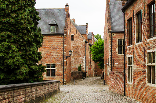View on belgian brick house in Groot Begijnhof Leuven, Belgium