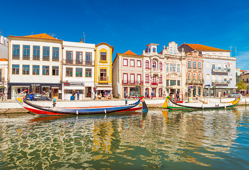 Aveiro - February 2019, Portugal: Colorful houses and boats in a small town also known as The Portuguese Venice