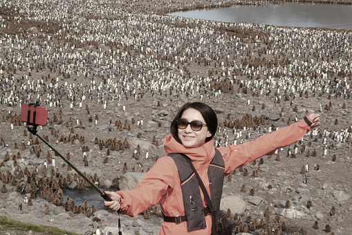 Women view penguins in South Georgia