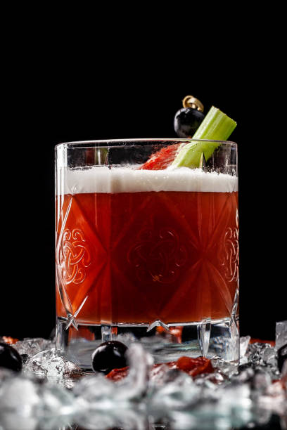 istock Alcoholic drinks and cocktails for bars and restaurants with ice on a black background in glass glasses. For the menu. 1131170099